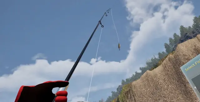 A rod raised against the sky with a lure hanging from its tip