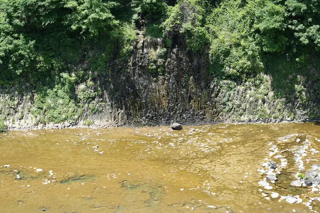 Wooded basalt cliffs above the Hantan River