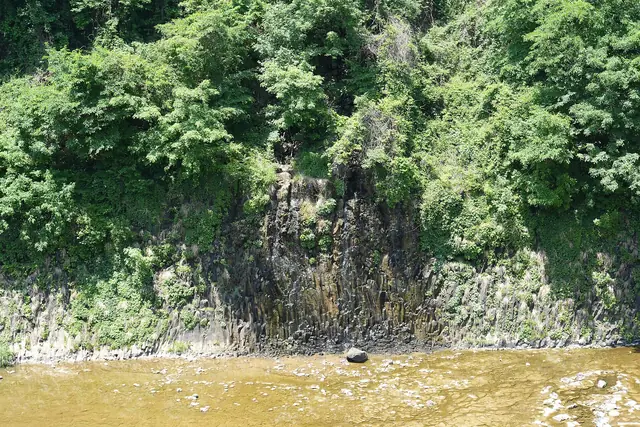 Wooded basalt cliffs above the Hantan River